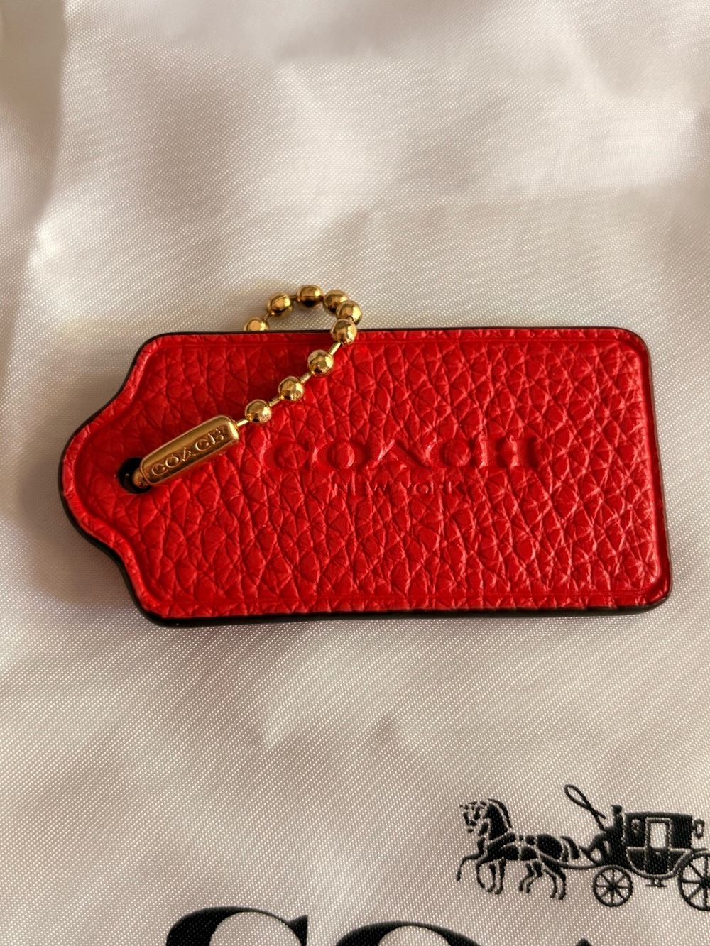 Coach hangtag bag charm